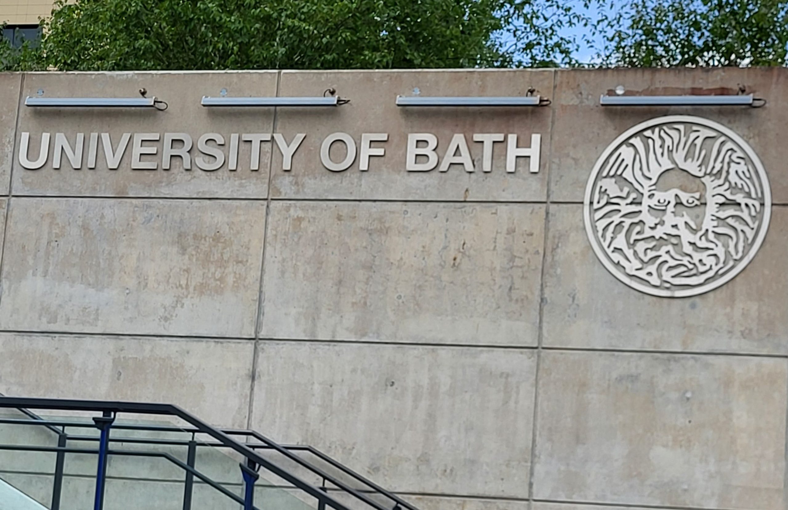 University of Bath name and logo on wall on campus